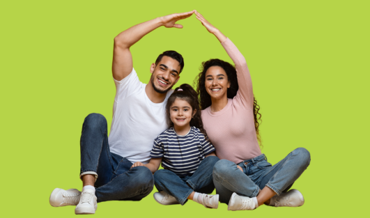 A man and woman making a house shape with their arms surrounding their daughter.