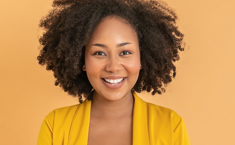 A woman smiling.