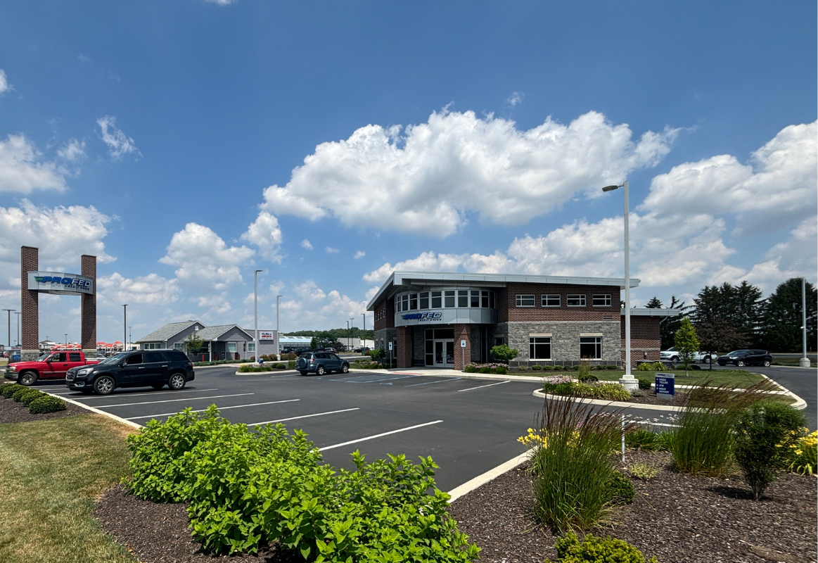 An image of the Columbia City Branch with three cars in the parking lot.