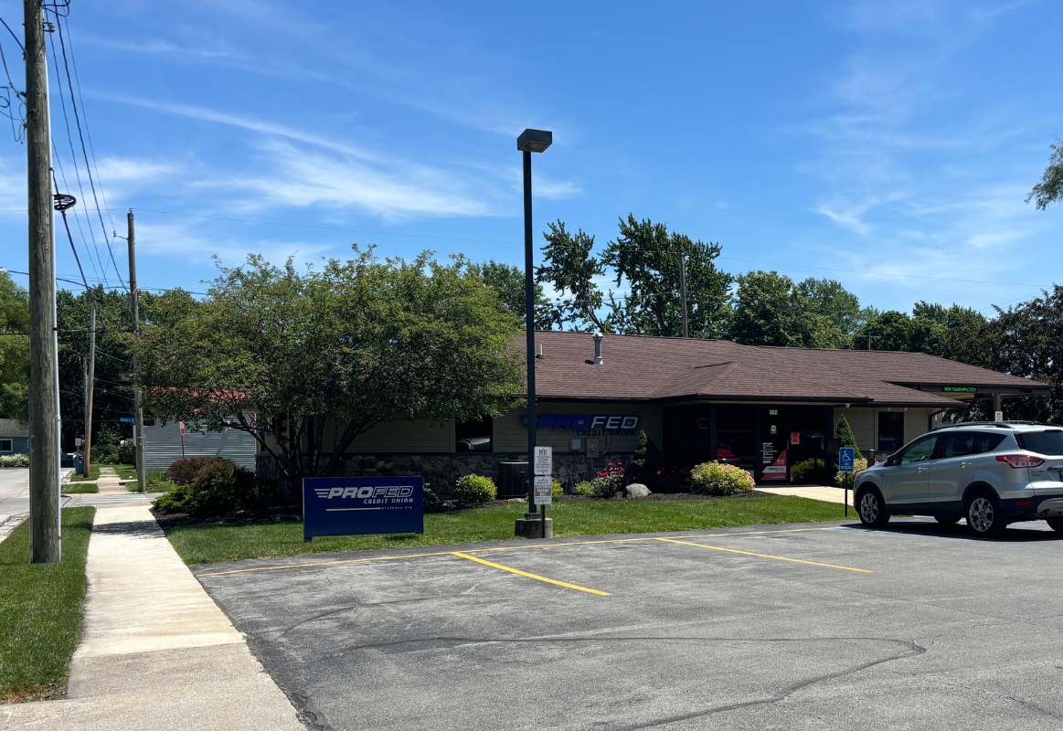 An image of the New Haven Branch with a car in the parking lot.