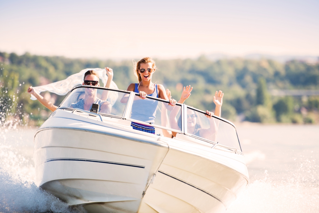 A family on a boat ride across the water.